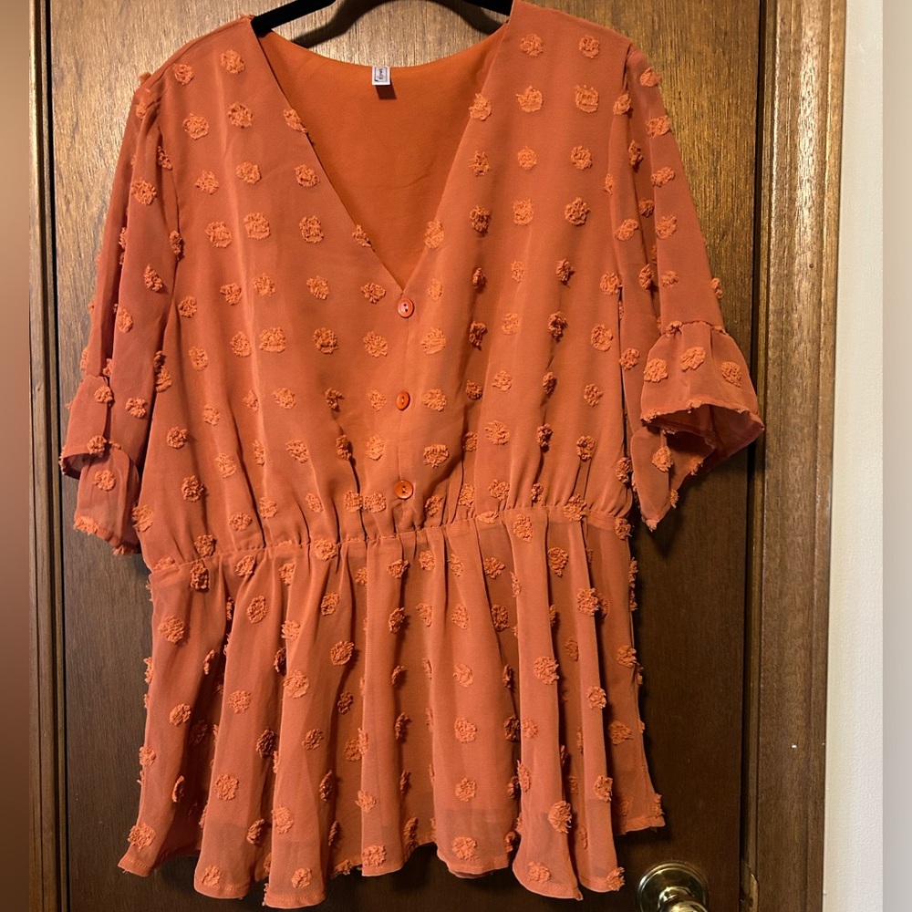 Flattering Orange Peplum top - size XL